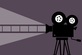 Filmprojektor mit Filmstreifen-Projektion.