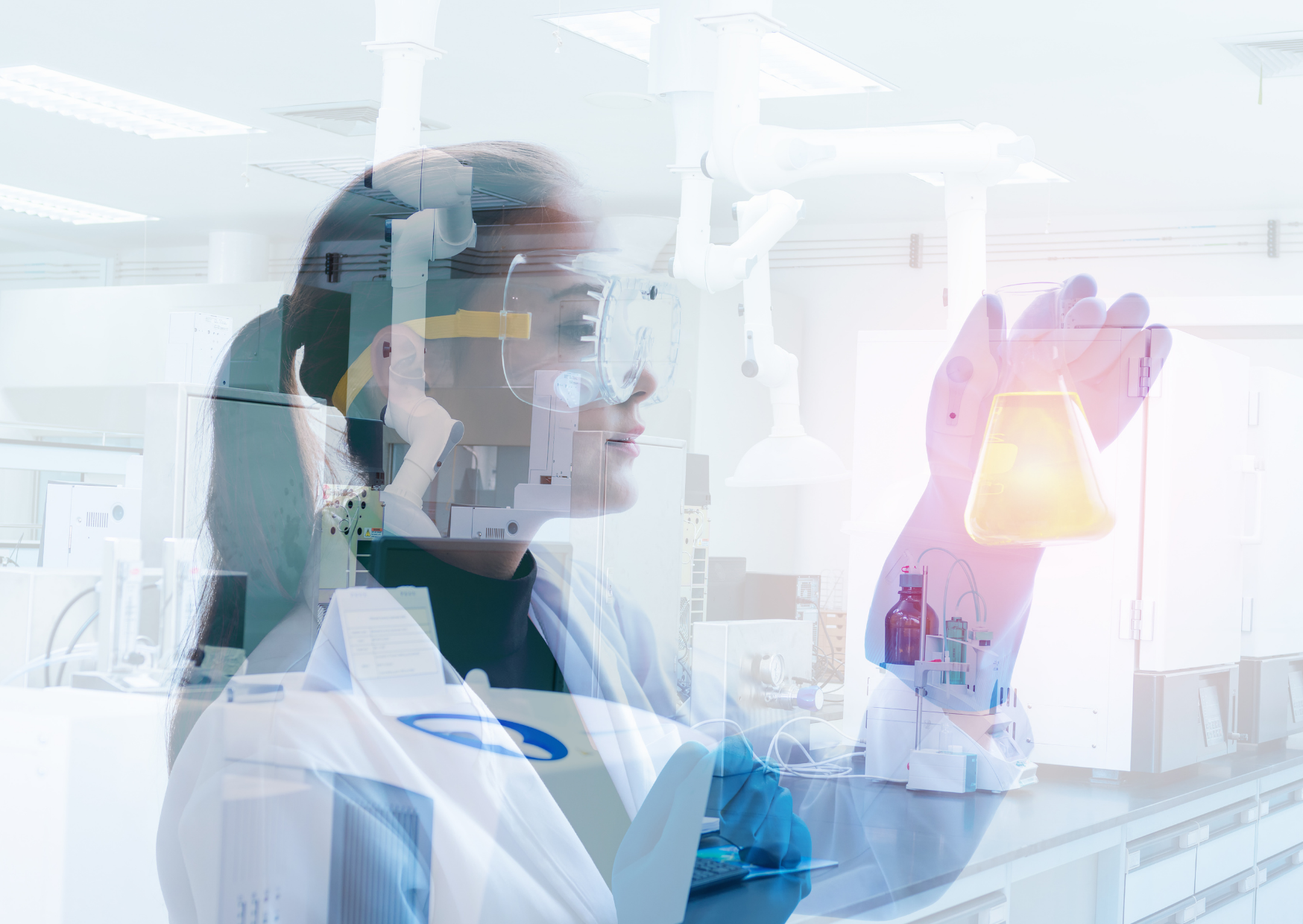 Scientist in lab coat examining a glowing yellow liquid in a conical flask in a laboratory.
