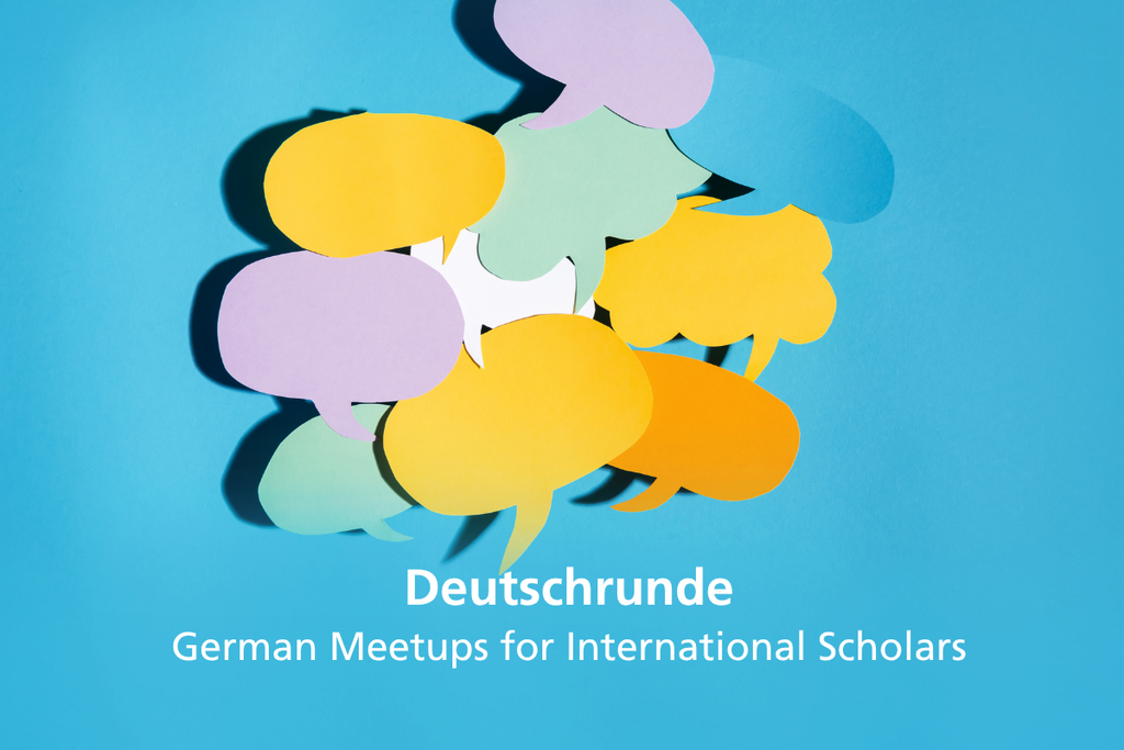 Fünf lächelnde Globus-Symbole, Zeichen für internationale Treffen.